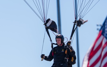 Soldiers from Army Golden Knights jump into Martinsville Motor Speedway ahead of the NASCAR race
