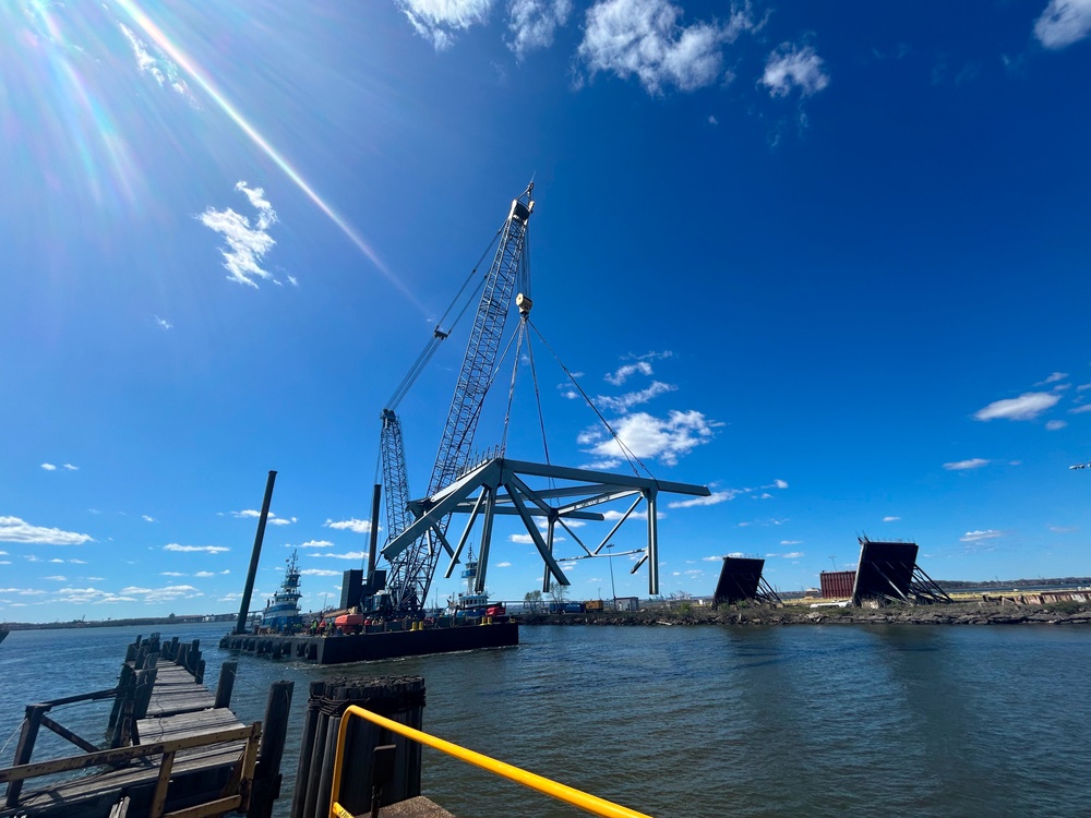 Salvage crews move a section of Francis Scott Key Bridge to Sparrows Point