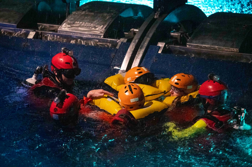 Rota Middle-High School's NJROTC Students Tour Underwater Egress Training Facility