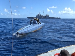 USS Leyte Gulf Coast Guard LEDET and HSM 50 Intercept Drug Smuggling Vessel