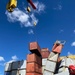 Containers being moved from bow of the MV Dali