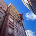 Containers being moved from bow of the MV Dali