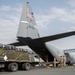 Airmen load AFCENT C-130s with humanitarian aid bound for Gaza