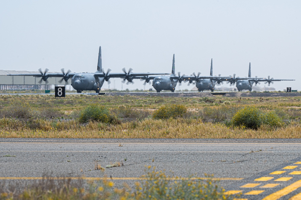 Airmen load AFCENT C-130s with humanitarian aid bound for Gaza