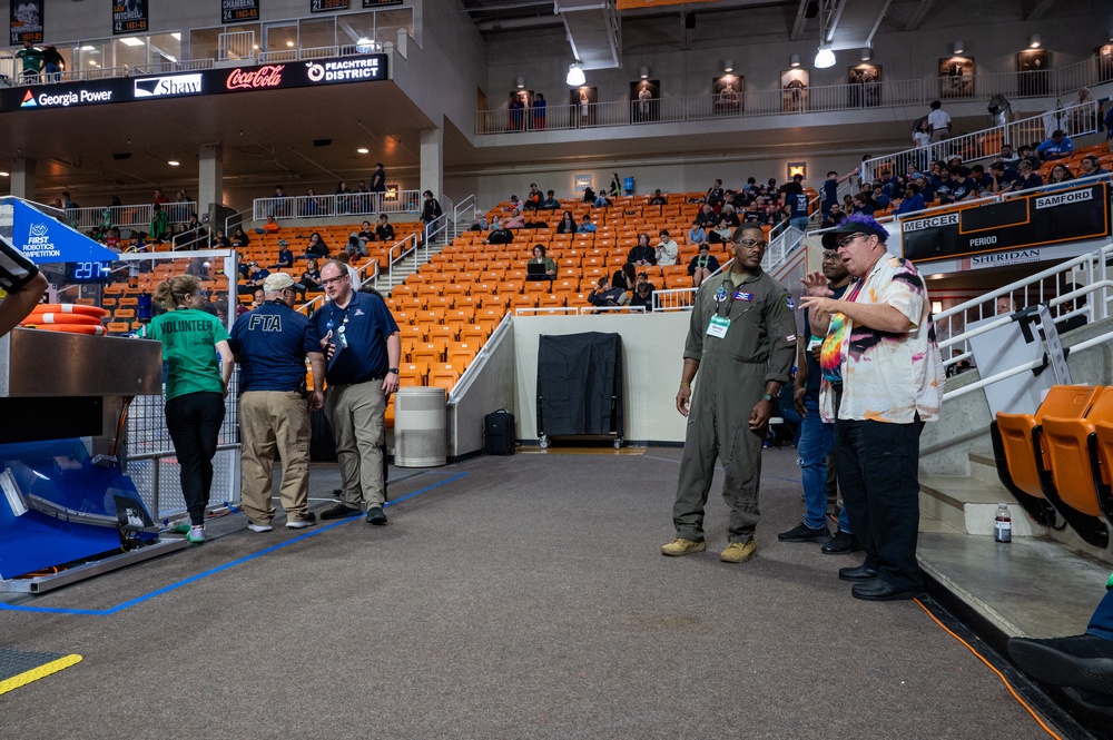 Photo of 116th Air Control Wing members participating in high school robotics competition at Mercer University