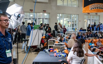 Photo of 116th Air Control Wing members participating in high school robotics competition at Mercer University