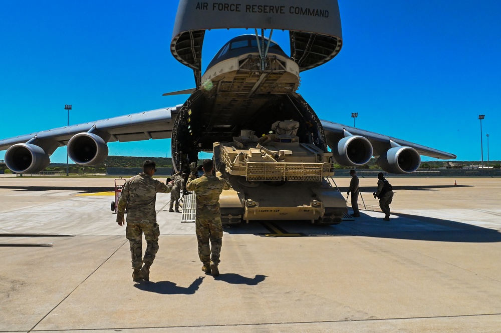 Army Vehicles Go Airborne As C-5 Shows Off Airlift Muscle Before Airshow