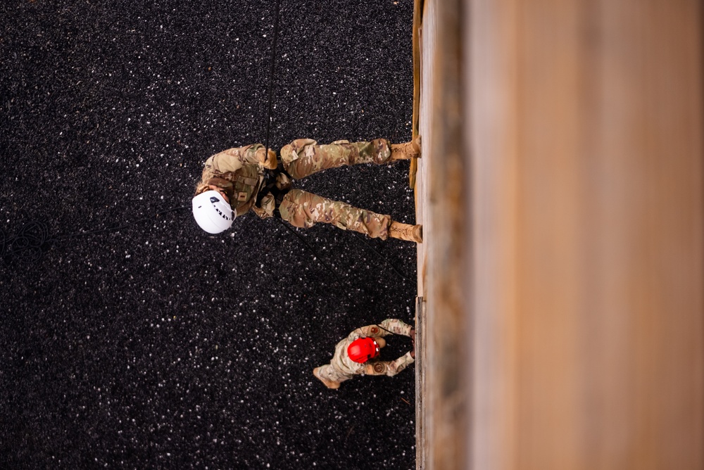 OTS cadets push through the Blue Thunder obstacle course