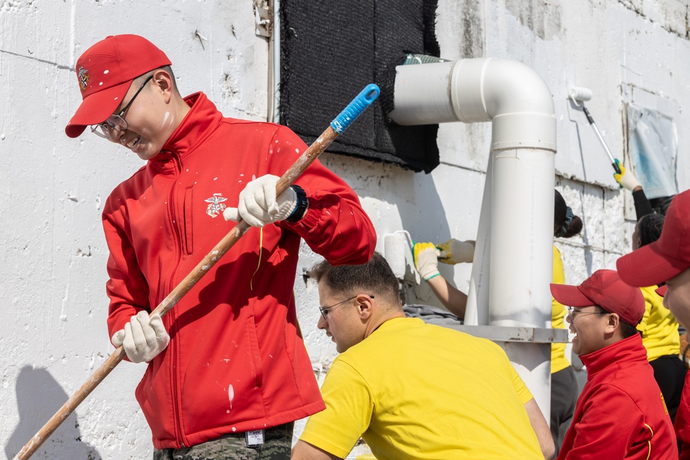 U.S. Marines, Koreans volunteer together to paint village during Freedom Shield 24