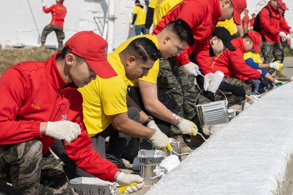 U.S. Marines, Koreans volunteer together to paint village during Freedom Shield 24