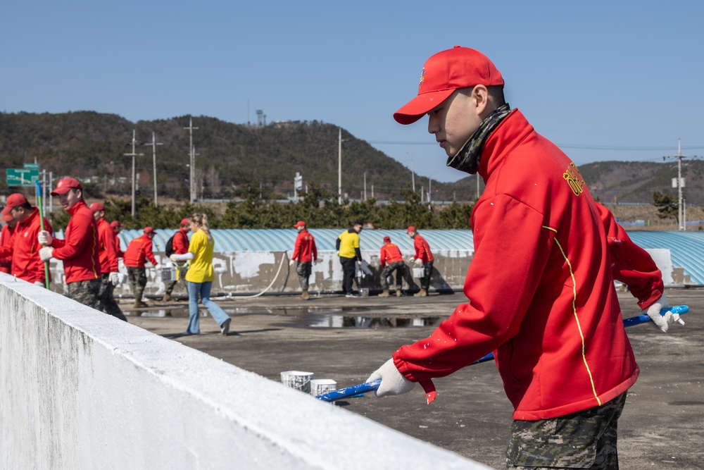 U.S. Marines, Koreans volunteer together to paint village during Freedom Shield 24