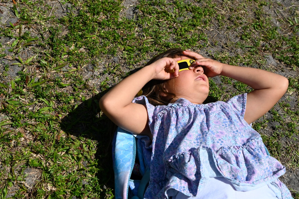 Military children view solar eclipse at MacDill AFB
