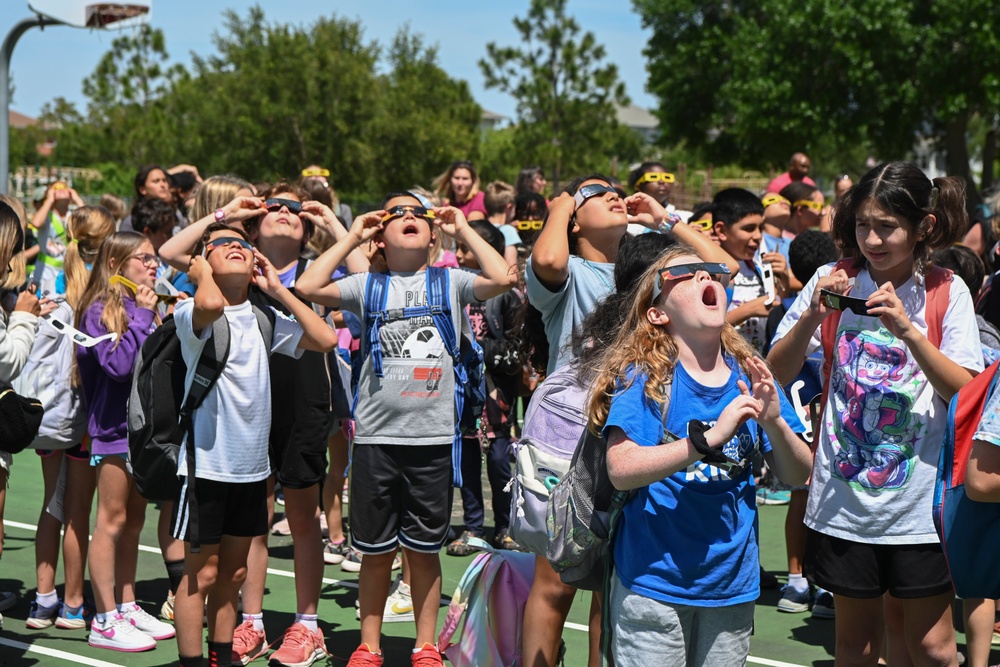 Military children view solar eclipse at MacDill AFB