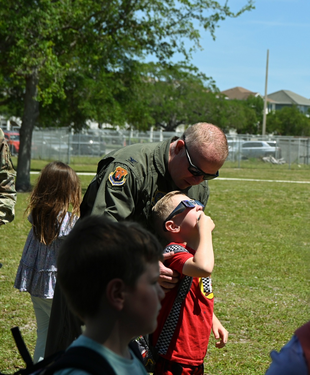 Military children view solar eclipse at MacDill AFB
