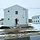 Reset of World War II-era barracks moved in 2023 continues; work nearly complete