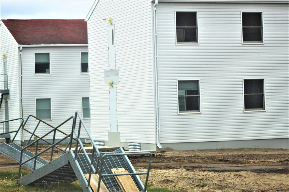 Reset of World War II-era barracks moved in 2023 continues; work nearly complete