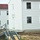 Reset of World War II-era barracks moved in 2023 continues; work nearly complete
