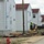 Reset of World War II-era barracks moved in 2023 continues; work nearly complete
