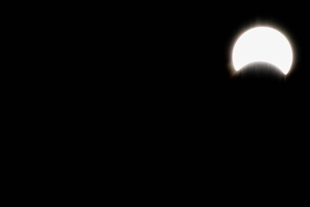 Partial solar eclipse as seen from Travis Air Force Base