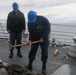 Sailors aboard the USS Howard conduct a sea and anchor detail in Okinawa, Japan