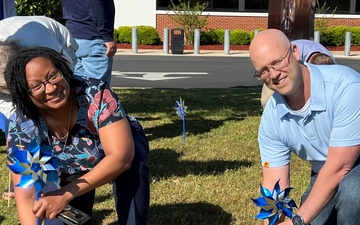 Lyster plants pinwheel garden for Child Abuse Prevention Month