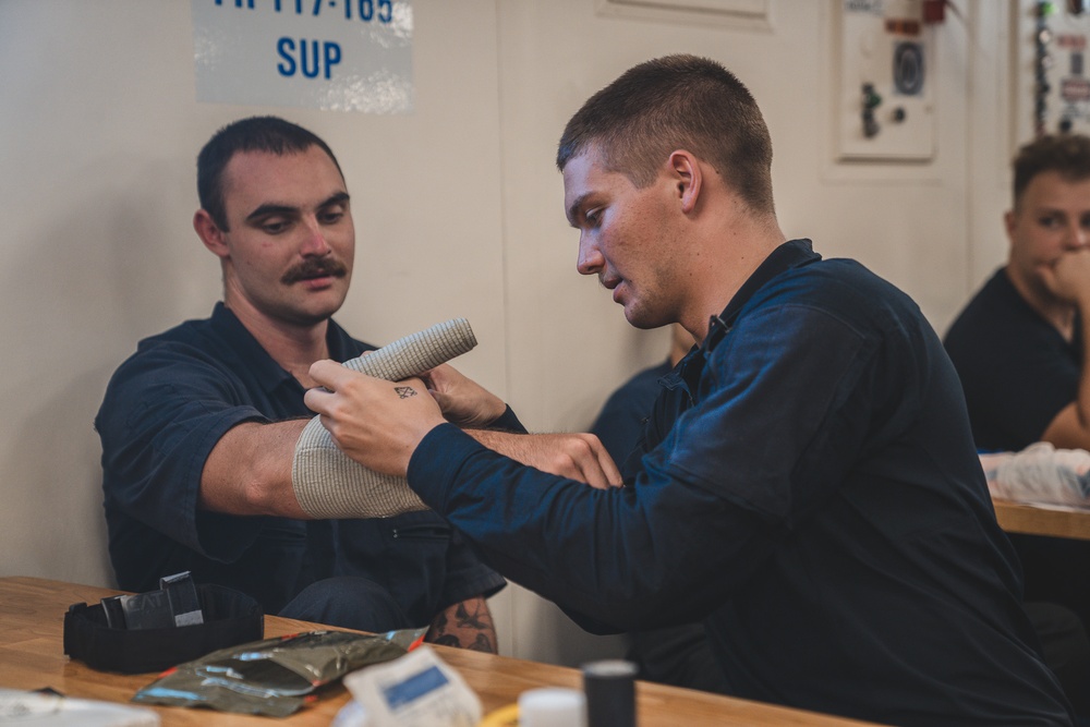 U.S. Coast Guard Cutter Harriet Lane gives medical training underway in Coral Sea