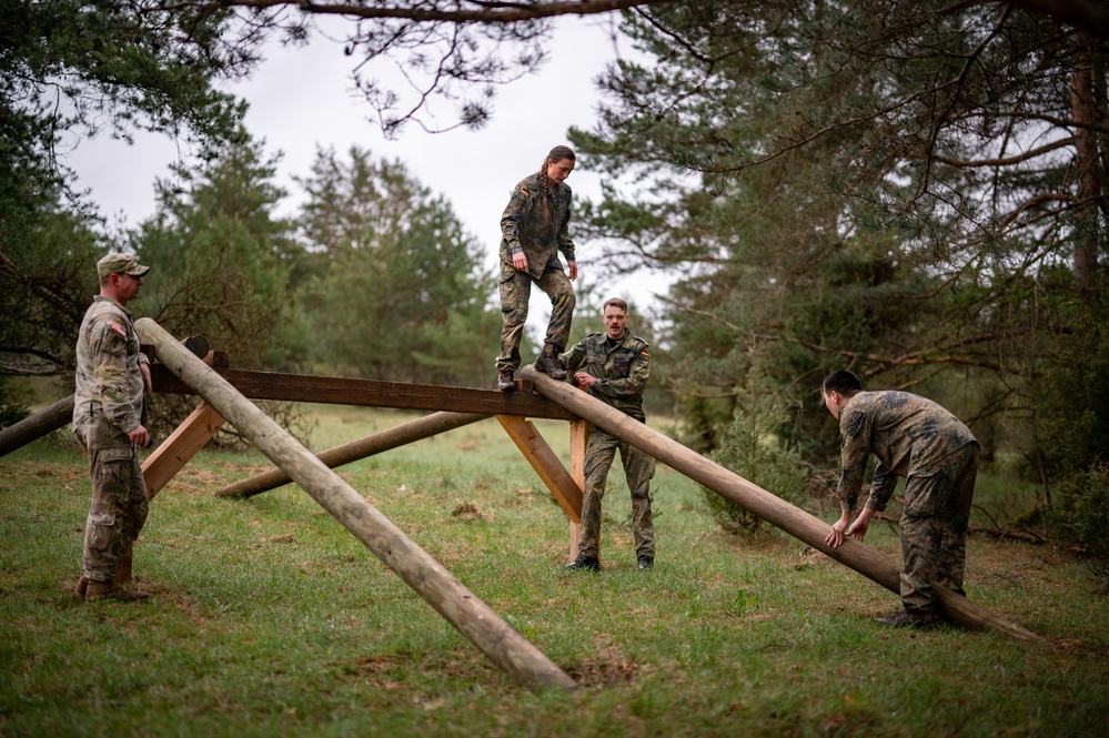 German Cadets Traversing Logs