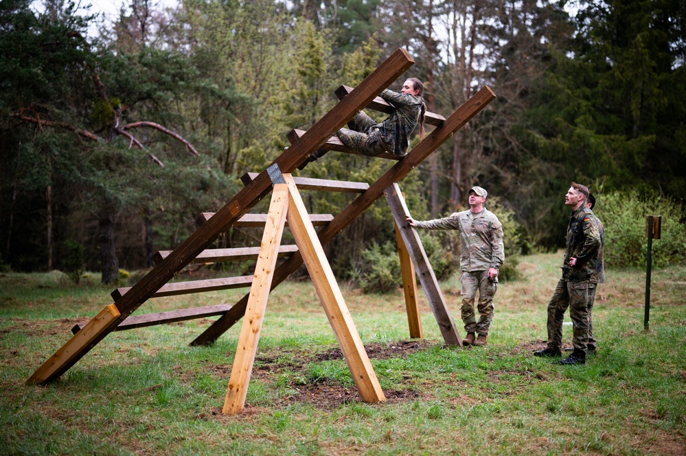 German Cadets Run Through an Obstacle Course