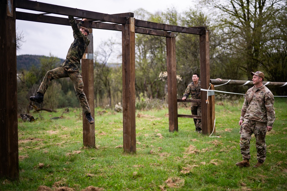 German Cadets Run Through Monkey Bars