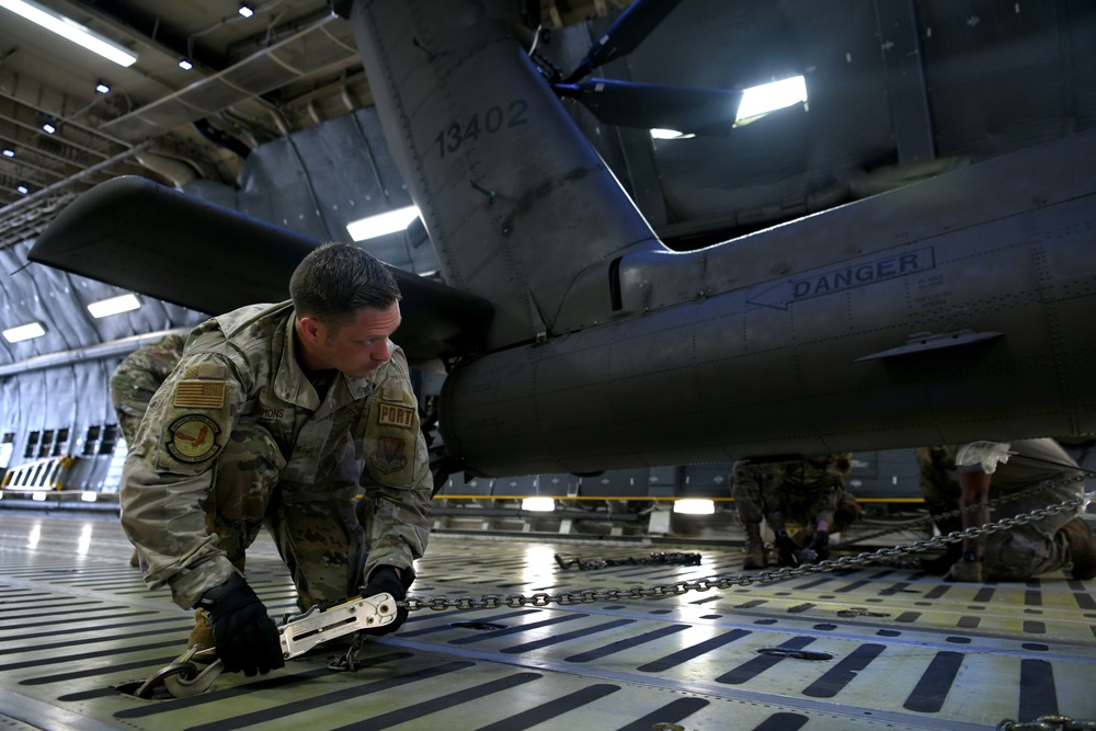 U.S. Army, Air Force team up to load helicopters at Shaw