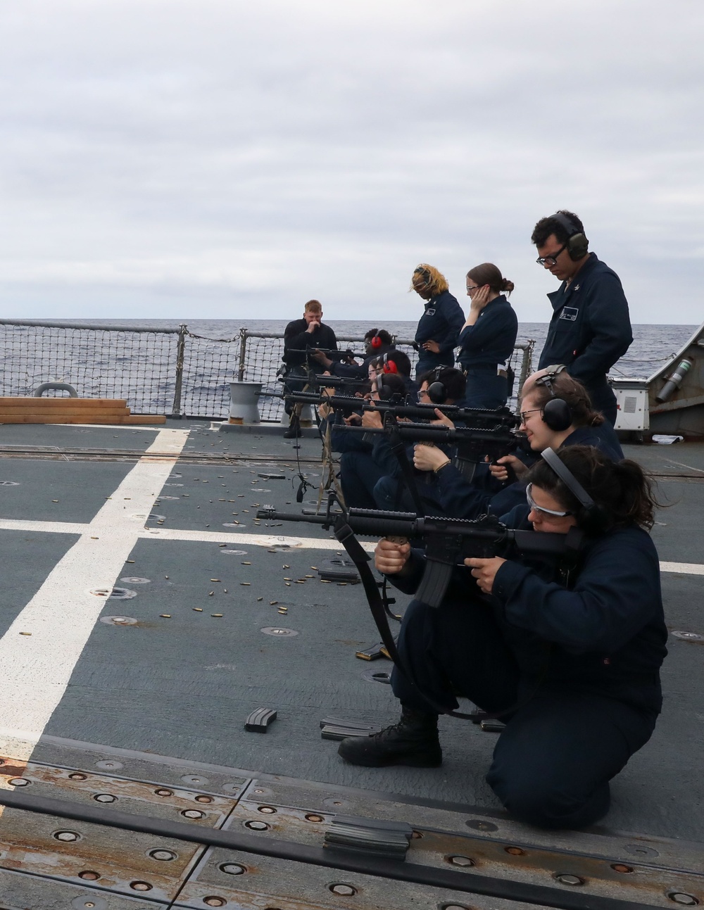 Sailors aboard the USS Howard conduct a live-fire gunnery exercise in the Philippine Sea