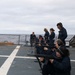 Sailors aboard the USS Howard conduct a live-fire gunnery exercise in the Philippine Sea