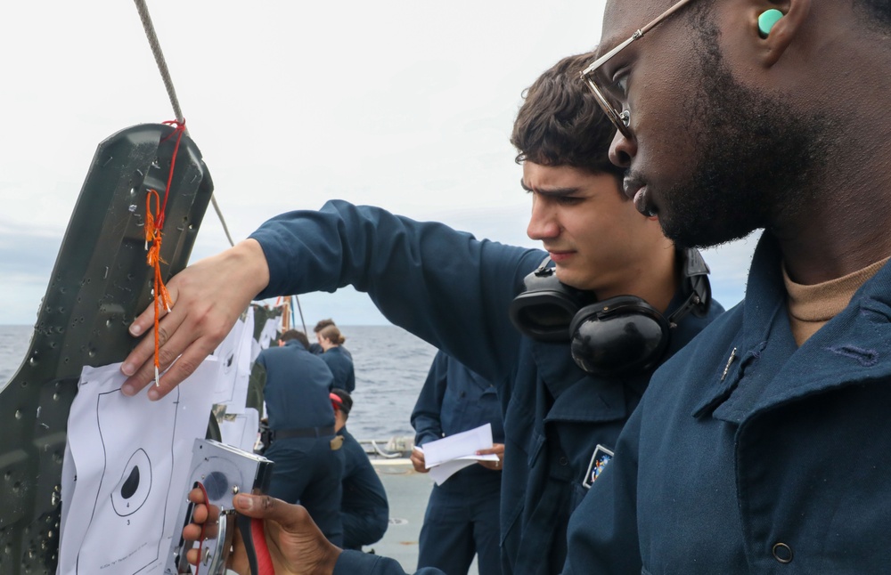 Sailors aboard the USS Howard conduct a live-fire gunnery exercise in the Philippine Sea