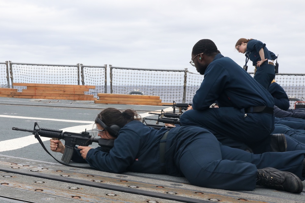 Sailors aboard the USS Howard conduct a live-fire gunnery exercise in the Philippine Sea