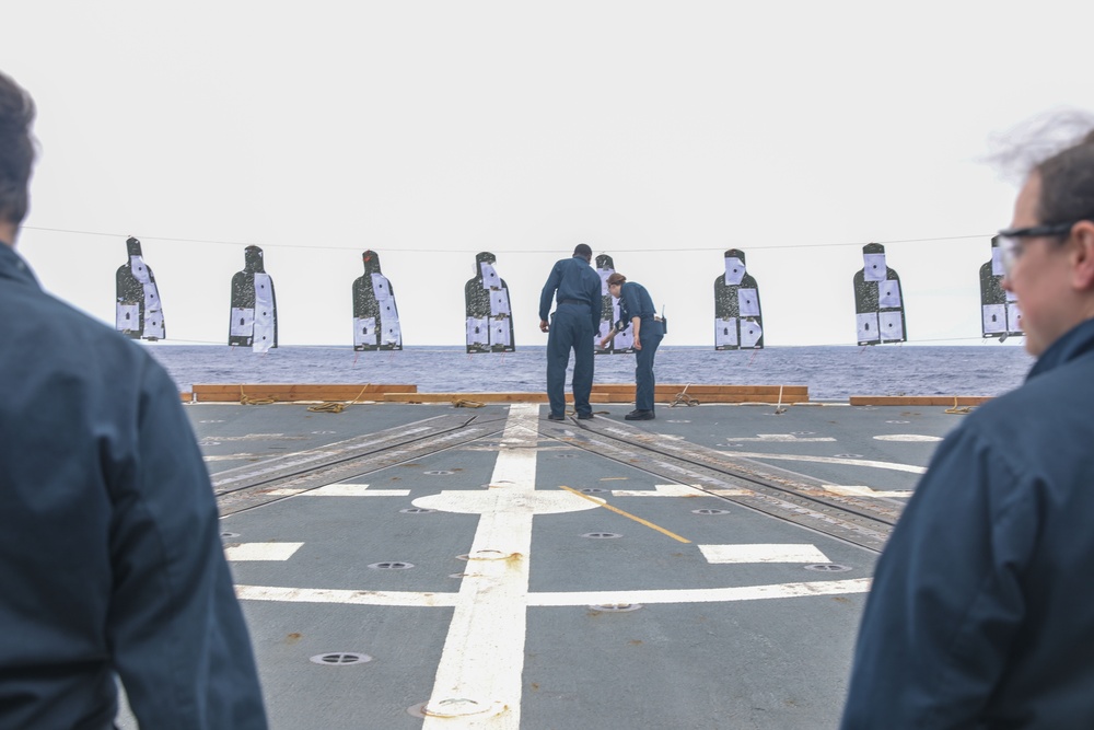 Sailors aboard the USS Howard conduct a live-fire gunnery exercise in the Philippine Sea