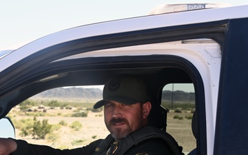 Yuma Proving Ground Conservation Law Enforcement Officer assists in mine rescue