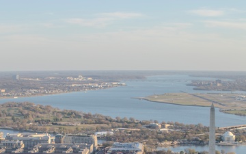 12th Aviation Battalion Flies Over Washington, D.C. During Peak Cherry Blossom Bloom