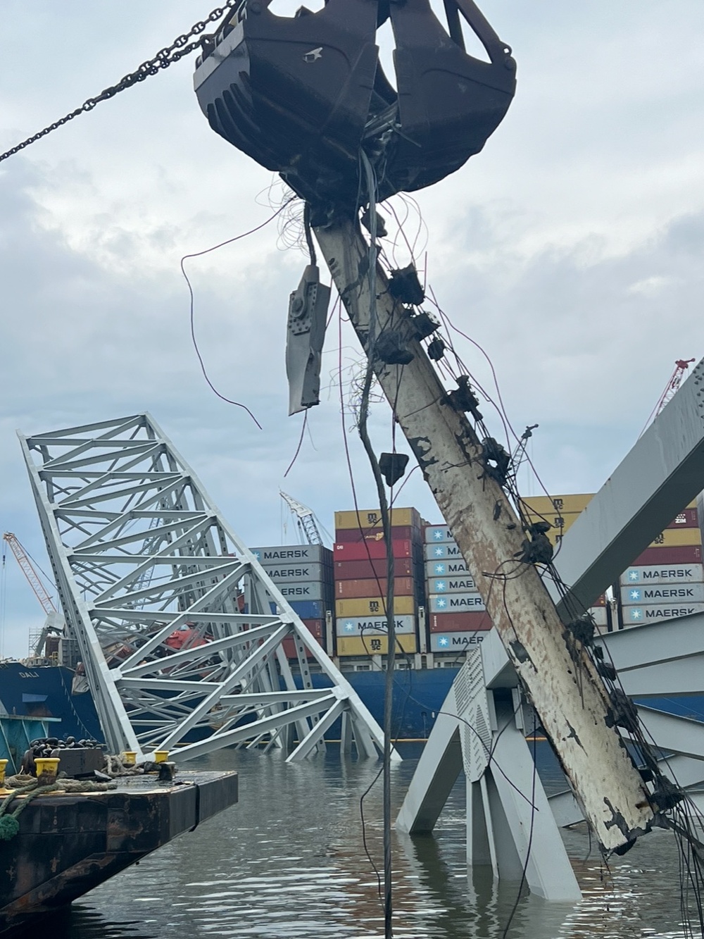 Salvors remove wreckage in wake of Francis Scott Bridge collapse