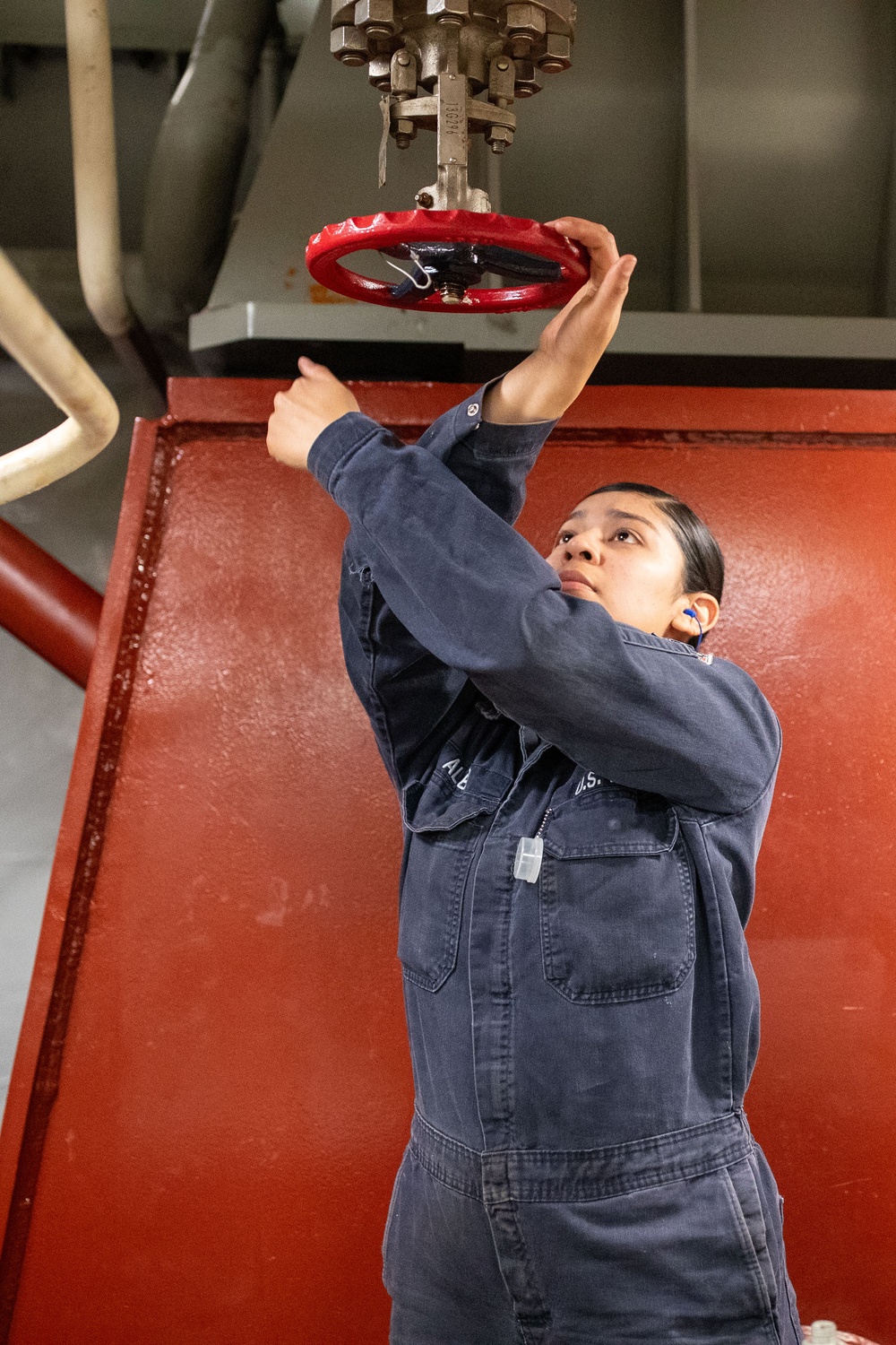 Sailors conduct maintenance aboard USS Tripoli