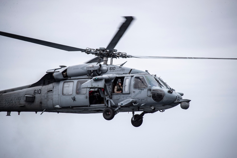 Abraham Lincoln conducts flight operations during friends and family day cruise