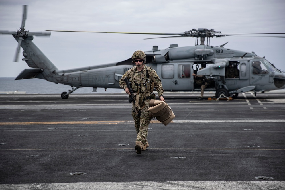 Abraham Lincoln conducts flight operations during friends and family day cruise