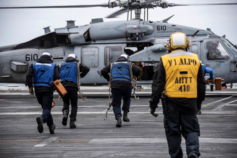 Abraham Lincoln conducts flight operations during friends and family day cruise