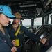 Sailors aboard the USS Howard stand watch in the North Pacific Ocean