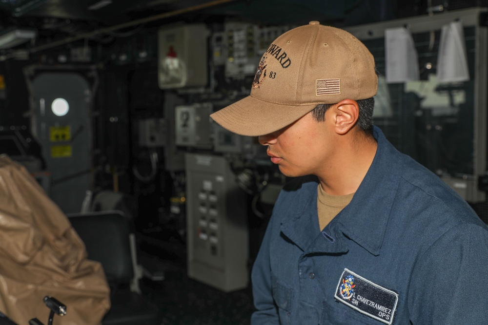 Sailors aboard the USS Howard stand watch in the North Pacific Ocean