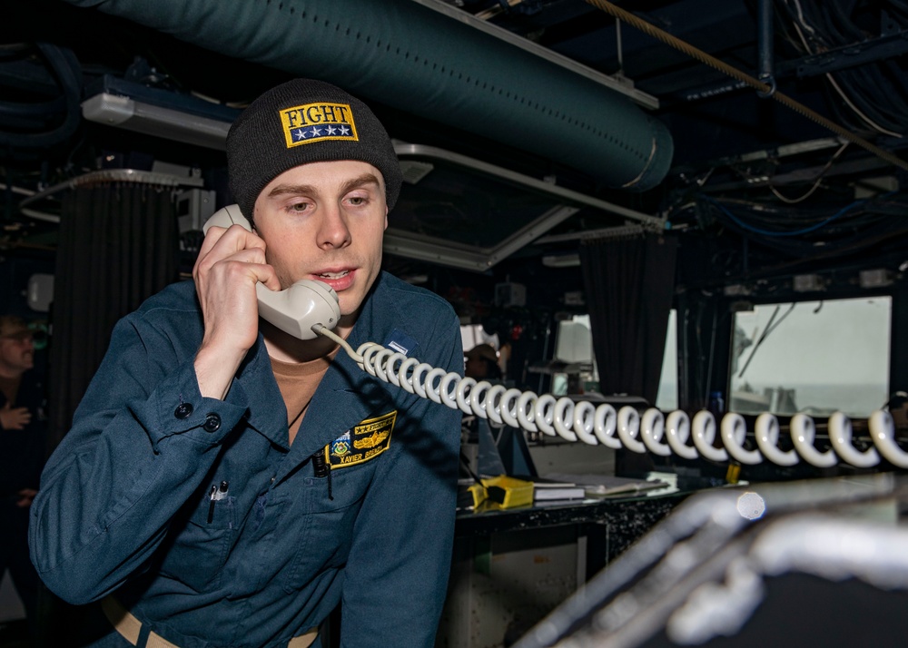 Sailors Conduct a Man Overboard Drill Aboard USS Dewey