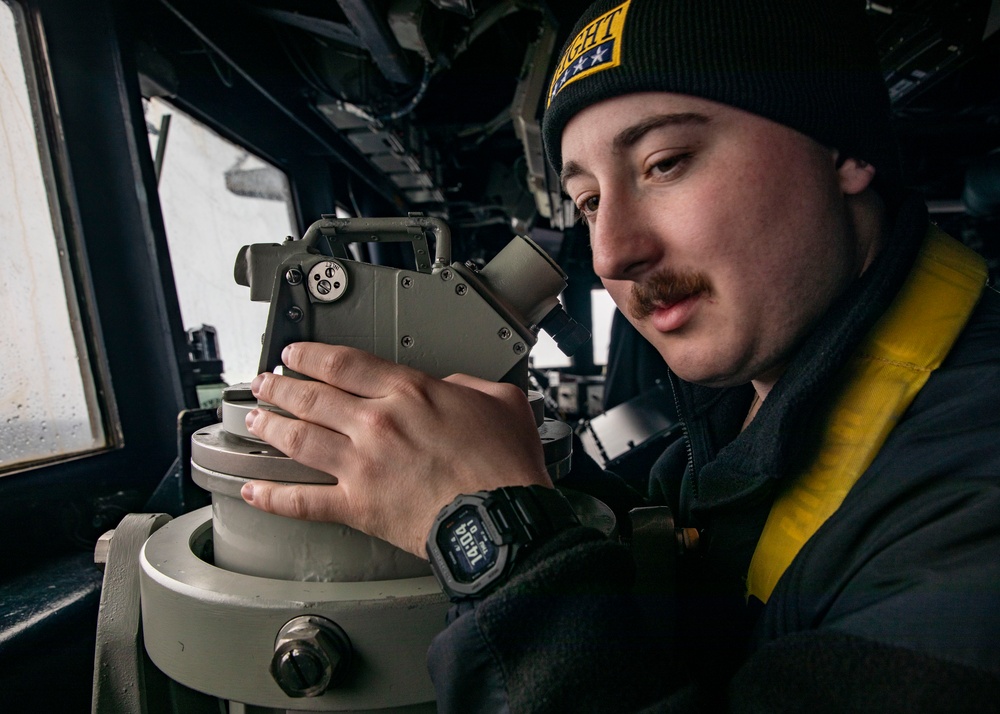 Sailors Conduct a Man Overboard Drill Aboard USS Dewey