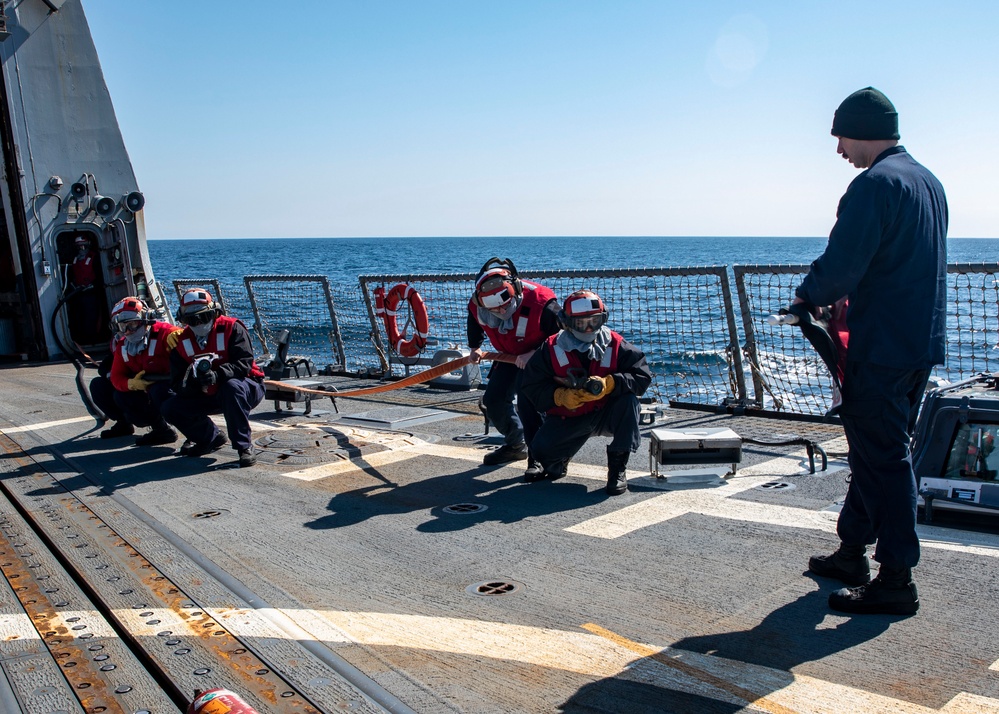 Sailors Conduct Crash and Salvage Drill Aboard USS Dewey, April 5