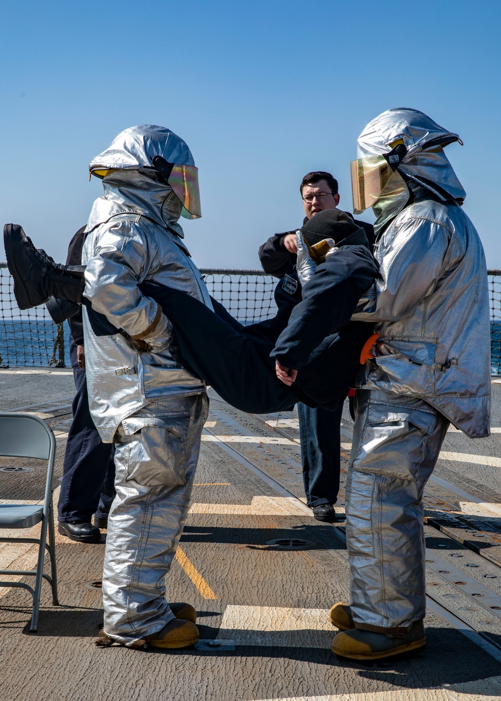 Sailors Conduct Crash and Salvage Drill Aboard USS Dewey, April 5