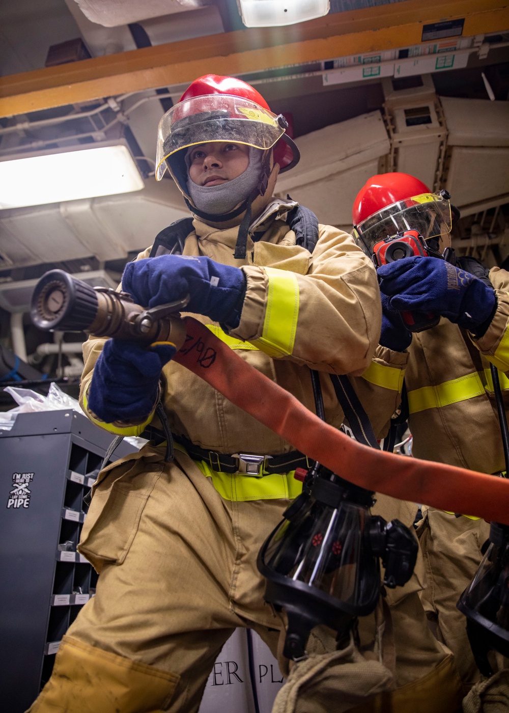 Sailors Conduct a General Quarters Drill Aboard USS Dewey, April 5