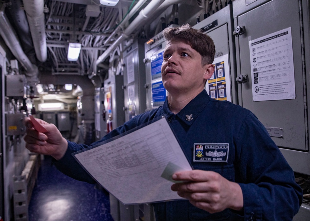 Sailors Conduct a General Quarters Drill Aboard USS Dewey, April 5